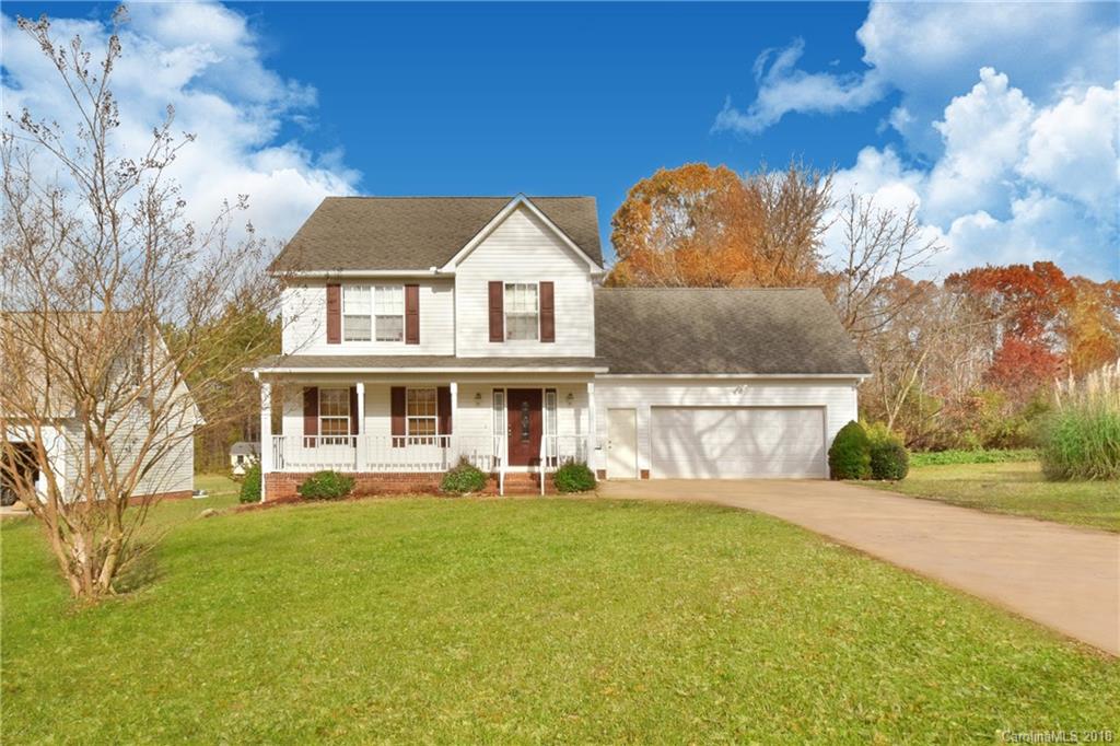 6290 Stokes Ferry Road Salisbury, NC 28146 - Photo 1 of 28 a front view of a house with a yard