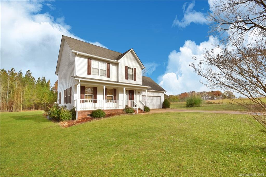 6290 Stokes Ferry Road Salisbury, NC 28146 - Photo 2 of 28 a front view of a house with a yard