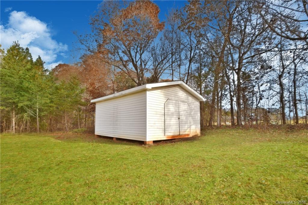 6290 Stokes Ferry Road Salisbury, NC 28146 - Photo 27 of 28 a view of swimming pool with an outdoor space