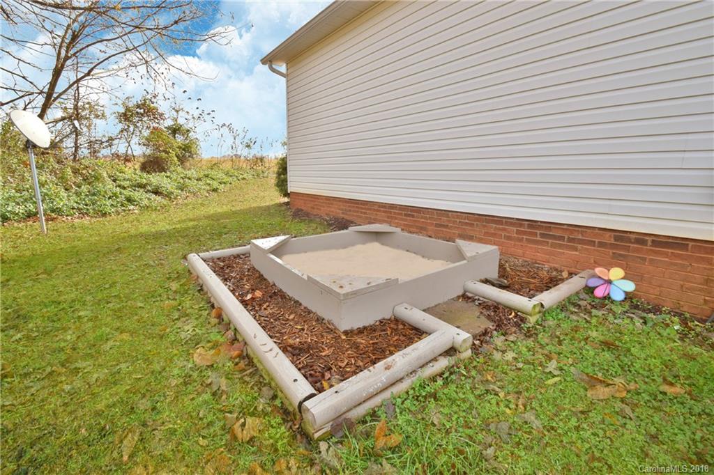 6290 Stokes Ferry Road Salisbury, NC 28146 - Photo 28 of 28 a view of a backyard with plants