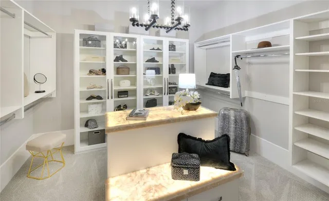 a living room with granite countertop furniture and a fireplace