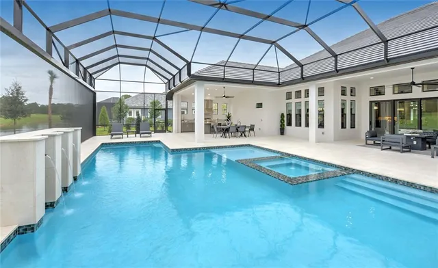a view of a swimming pool with a patio