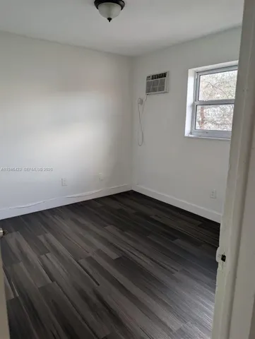 a view of small space with racks on the wall