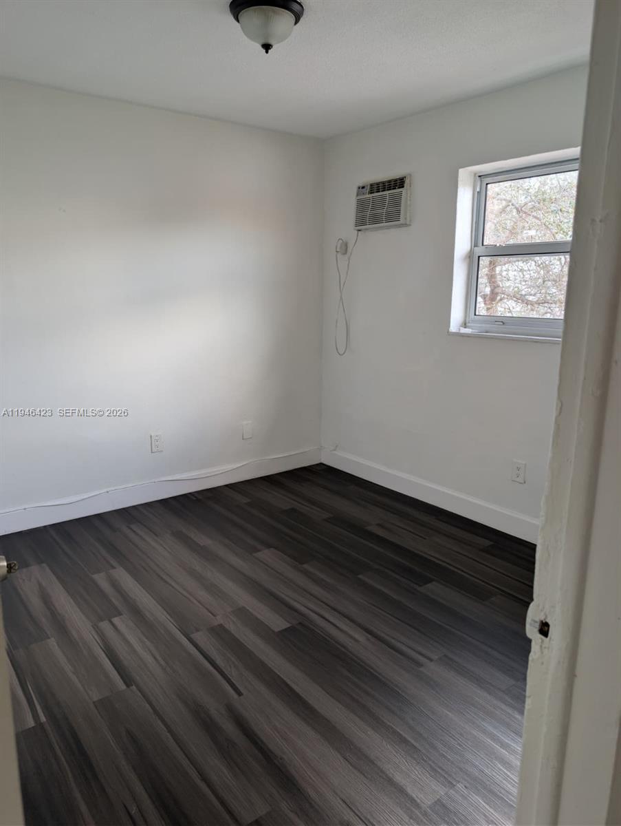 1461 Southwest 5th Street, Unit 5 Miami, FL 33135 - Photo 3 of 16 a view of small space with racks on the wall