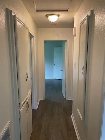 a view of a room with a bathroom