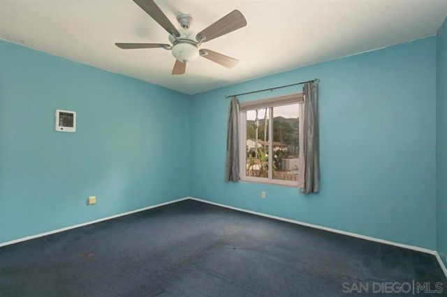 a view of lake with a mountain in the background