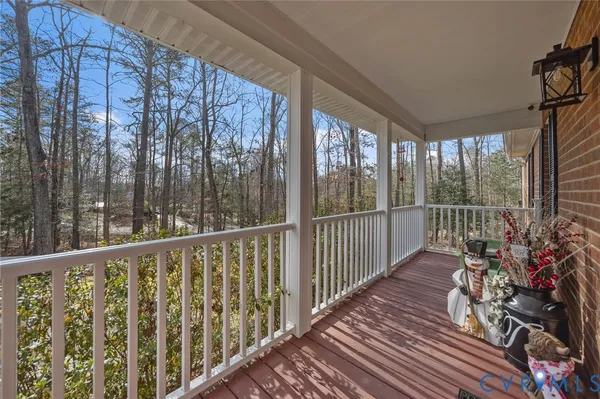 a view of balcony with furniture