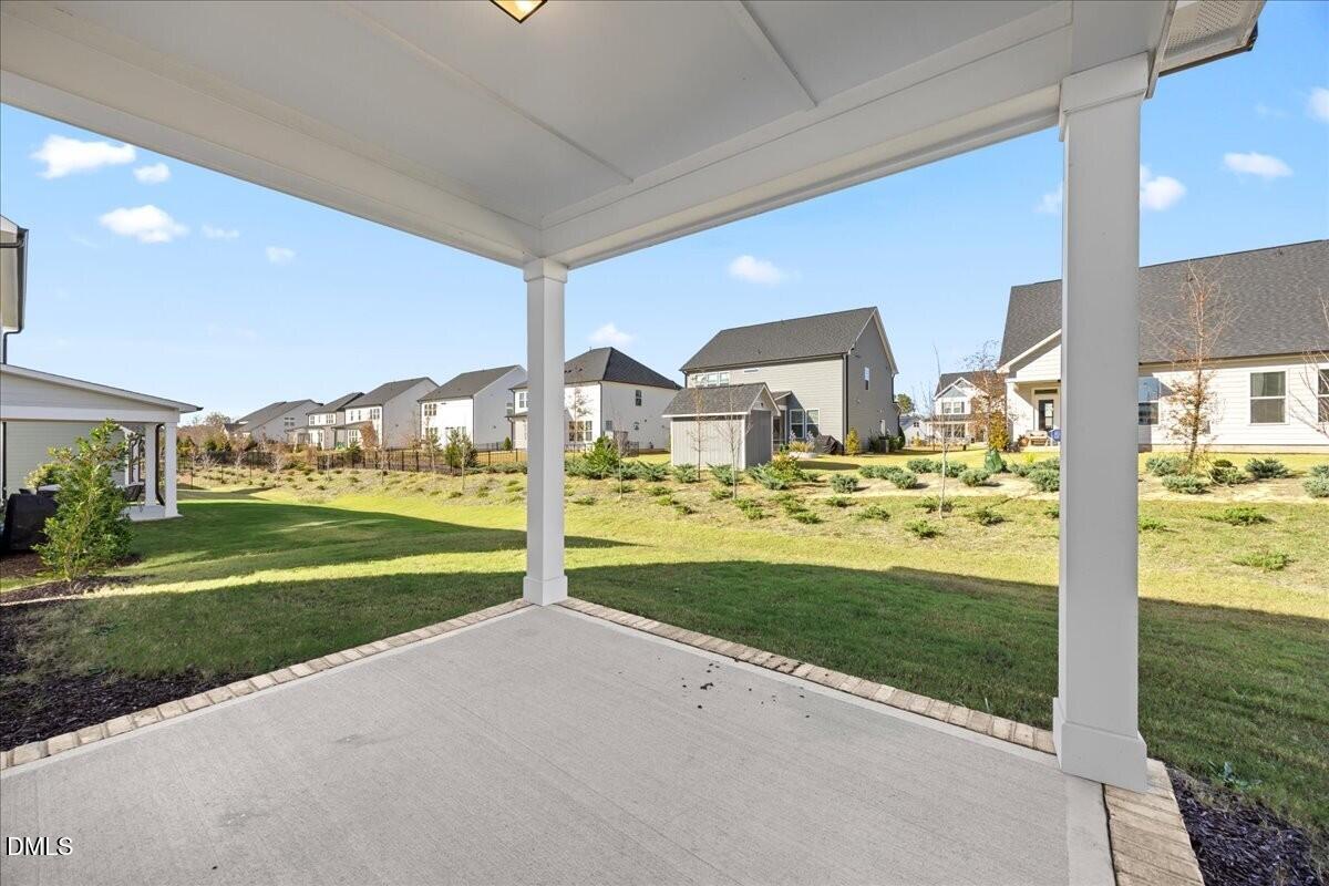 653 Craftsman Rdg Trail Knightdale, NC 27545 - Photo 41 of 50 a view of a porch with a big yard