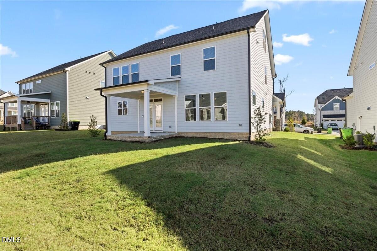 653 Craftsman Rdg Trail Knightdale, NC 27545 - Photo 43 of 50 a front view of a house with a yard
