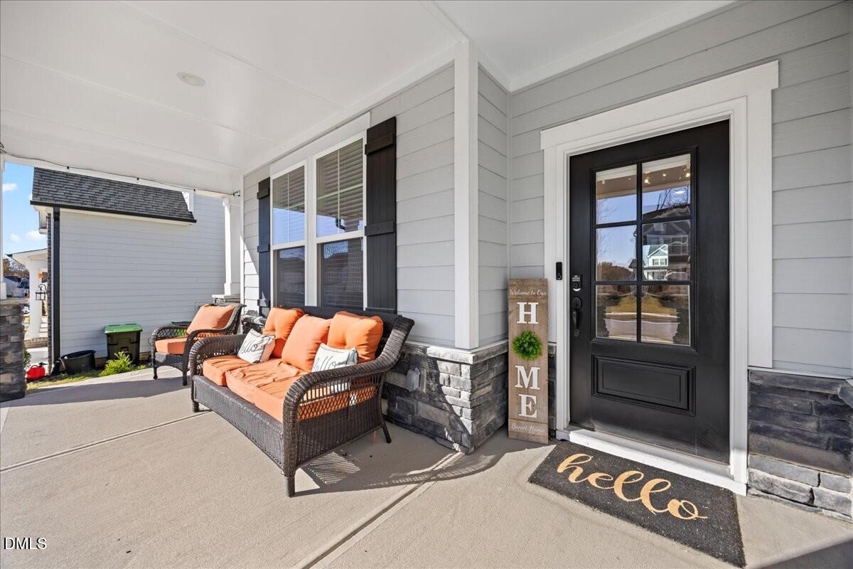 653 Craftsman Rdg Trail Knightdale, NC 27545 - Photo 3 of 50 a outdoor living space with furniture and a window