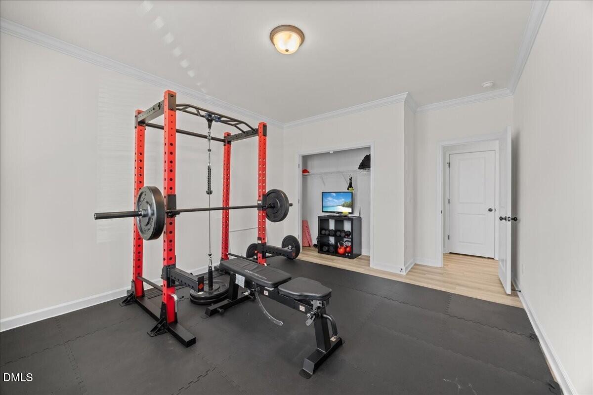 653 Craftsman Rdg Trail Knightdale, NC 27545 - Photo 8 of 50 a view of a room with gym equipment