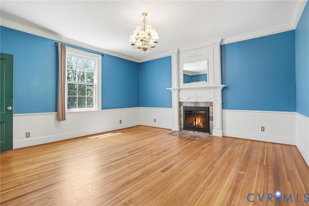2297 Indian Oak Road Crewe, VA 23930 - Photo 27 of 53 a view of an empty room with wooden floor and a window