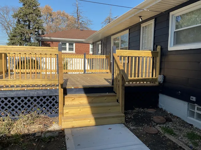 a balcony view with a garden