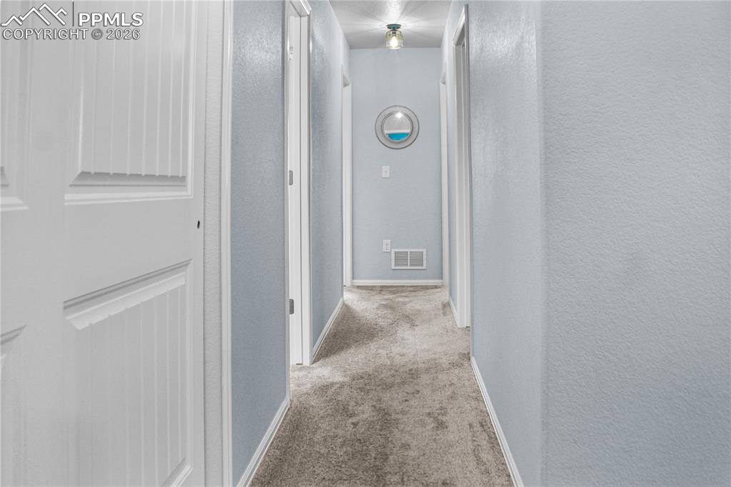 7649 Grand Fir Point Colorado Springs, CO 80908 - Photo 14 of 19 a view of a bathroom with shower