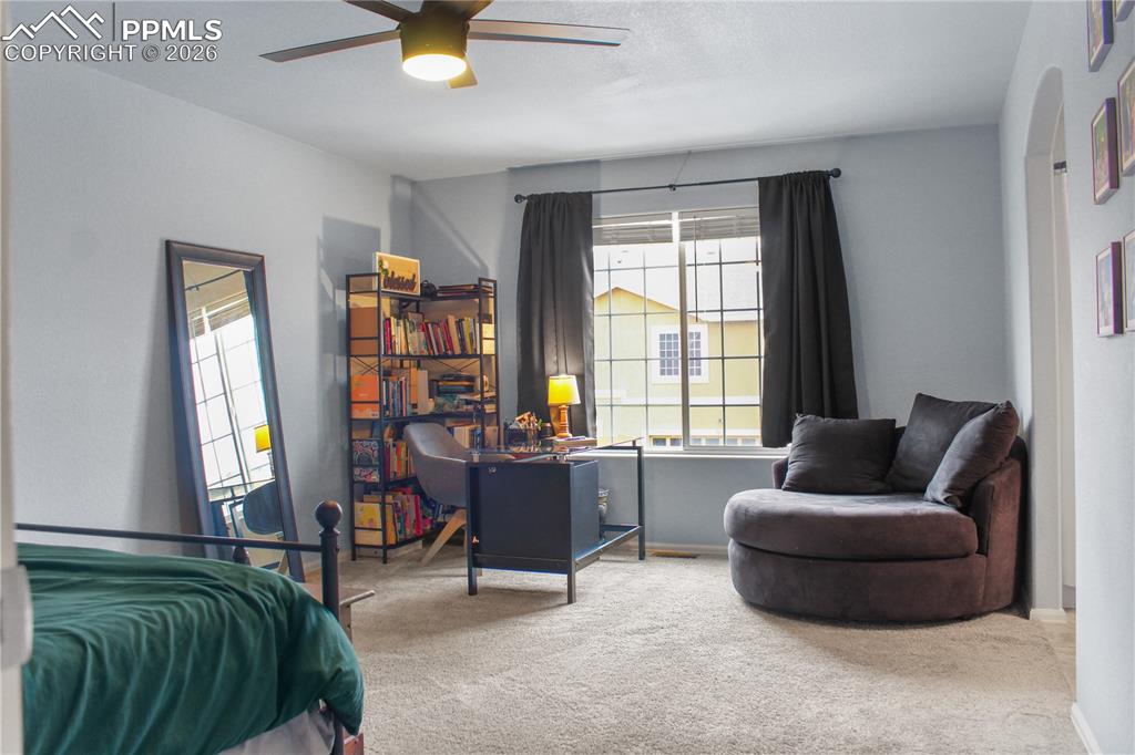 7649 Grand Fir Point Colorado Springs, CO 80908 - Photo 10 of 19 a living room with furniture and a window