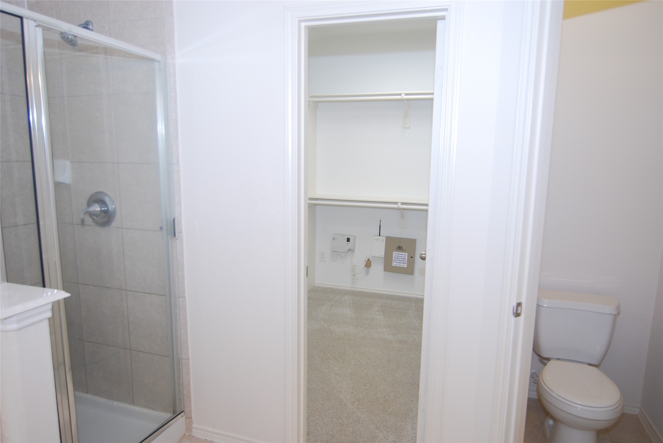 2834 Lockeridge Pines Drive Spring, TX 77386 - Photo 13 of 20 Primary bath, showing separate shower, large closet, and private commode.