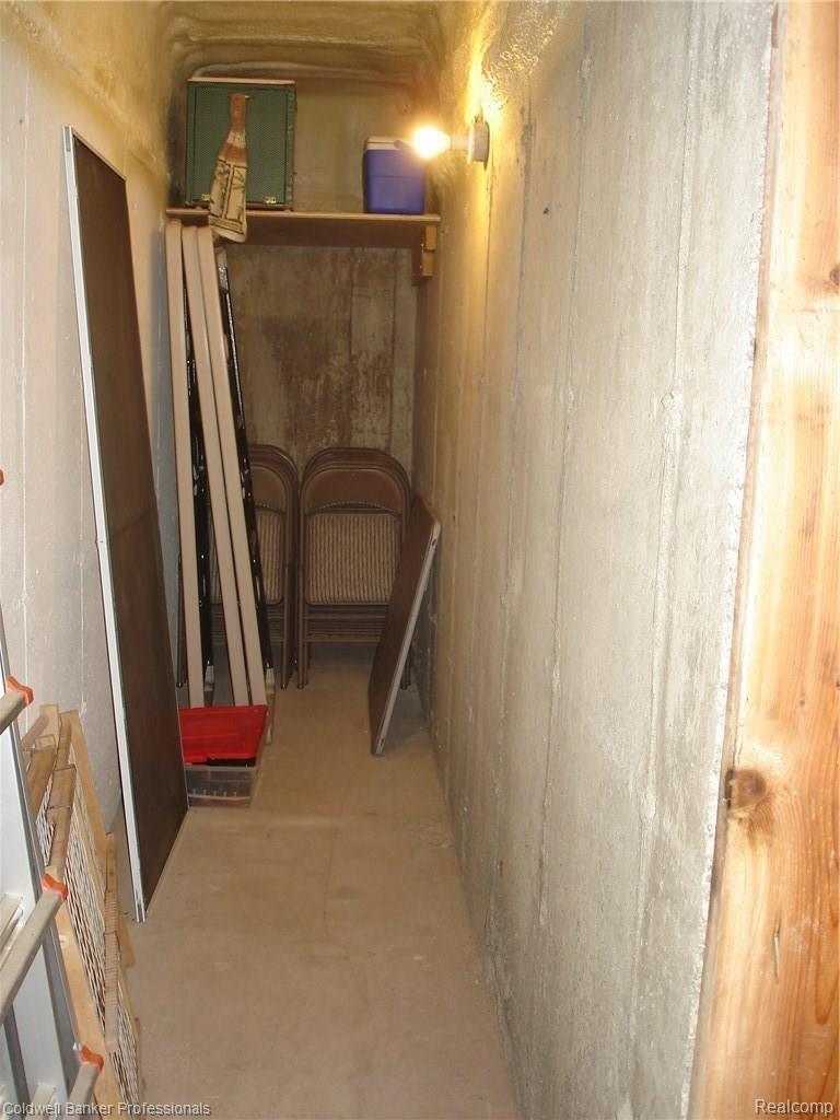 8715 Rattalee Lake Road Clarkston, MI 48348 - Photo 43 of 49 Shows Half of Storage Under Porch