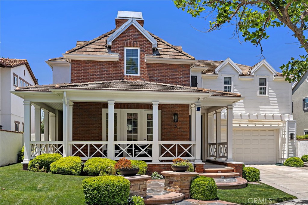 3 Tranquility Place Ladera Ranch, CA 92694 - Photo 45 of 63 a front view of a house with garden