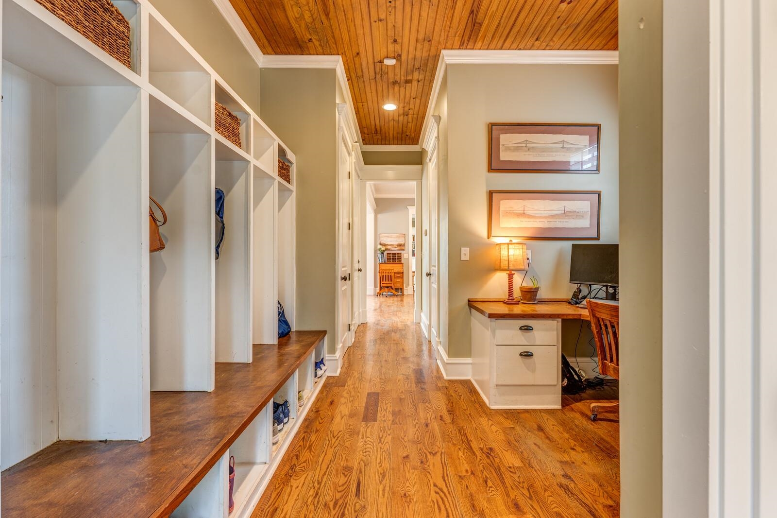 8888 Deadfall Road Millington, TN 38053 - Photo 20 of 25 a view of a hallway with wooden floor and staircase