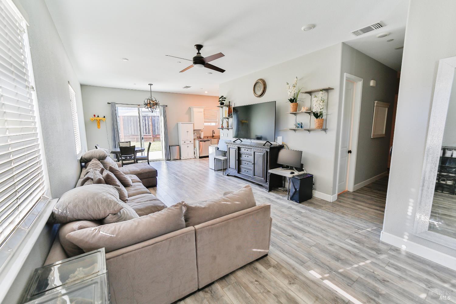 1331 Ridgecrest Court Santa Rosa, CA 95403 - Photo 5 of 19 a living room with furniture and a wooden floor