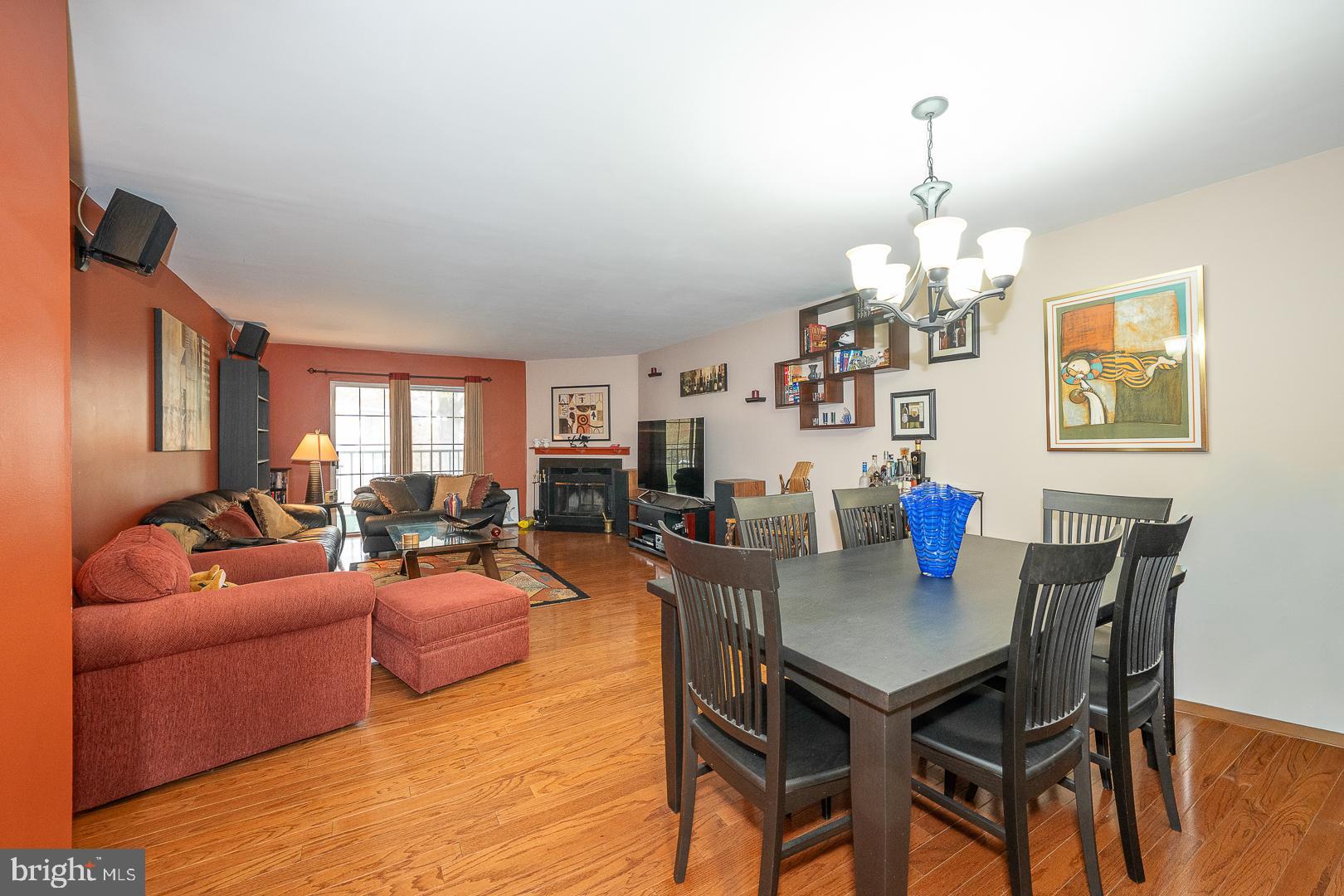 108 Valley Stream Circle, Unit 108A Chesterbrook, PA 19087 - Photo 2 of 22 a view of a livingroom and dining room with furniture wooden floor a chandelier