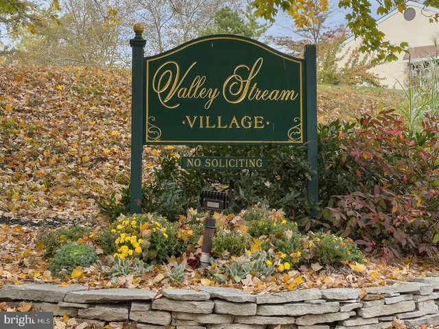 a sign broad on the side of the road