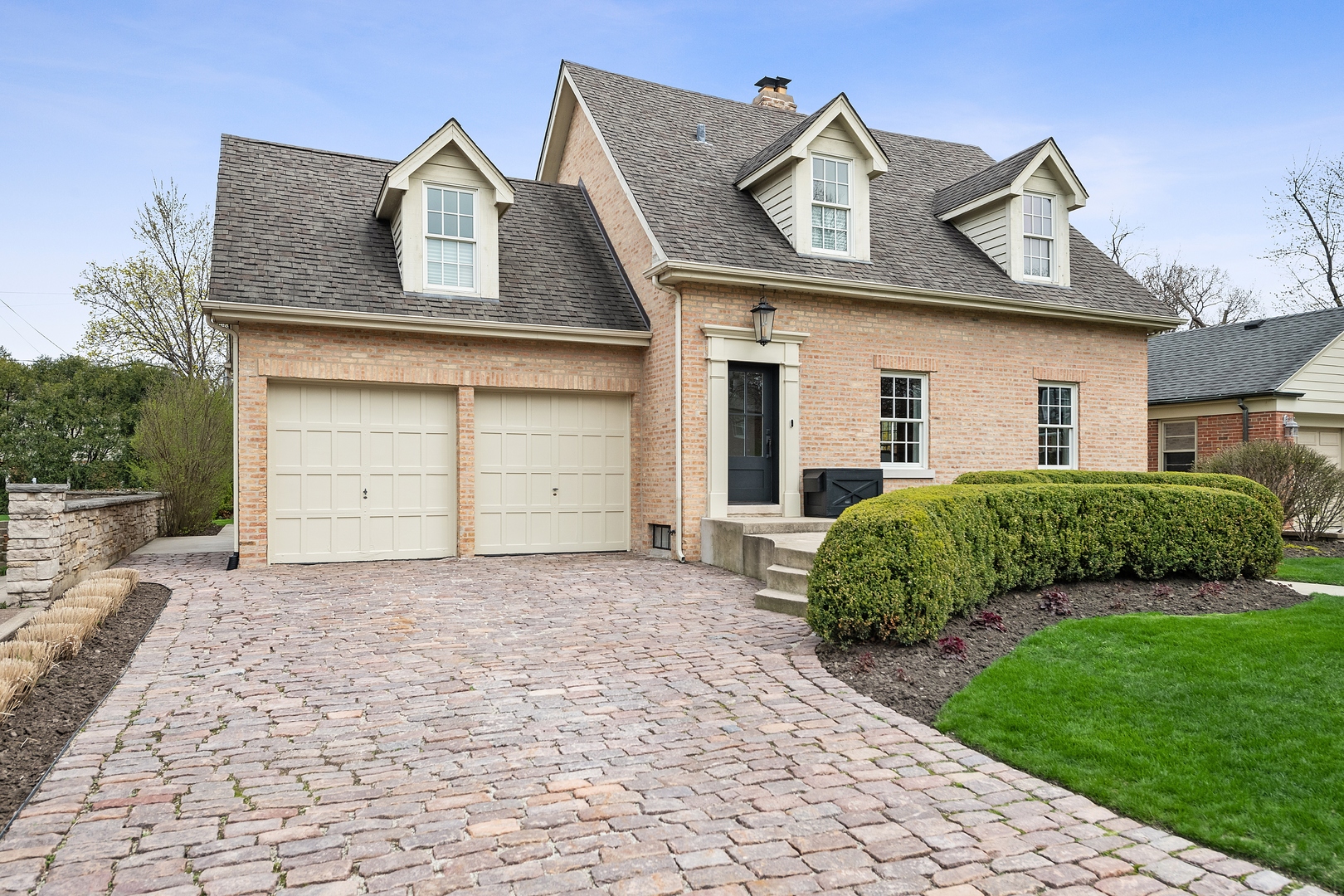 715 North Merrill Street Park Ridge, IL 60068 - Photo 1 of 19 a front view of a house with a yard and garage