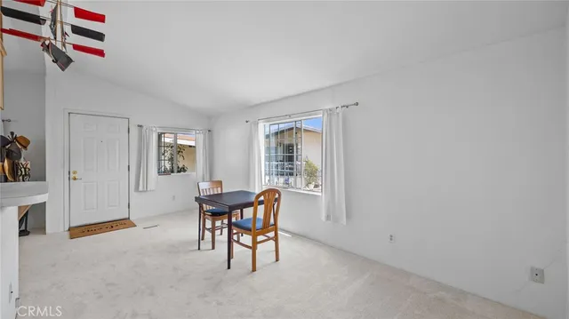 a workspace with furniture and window