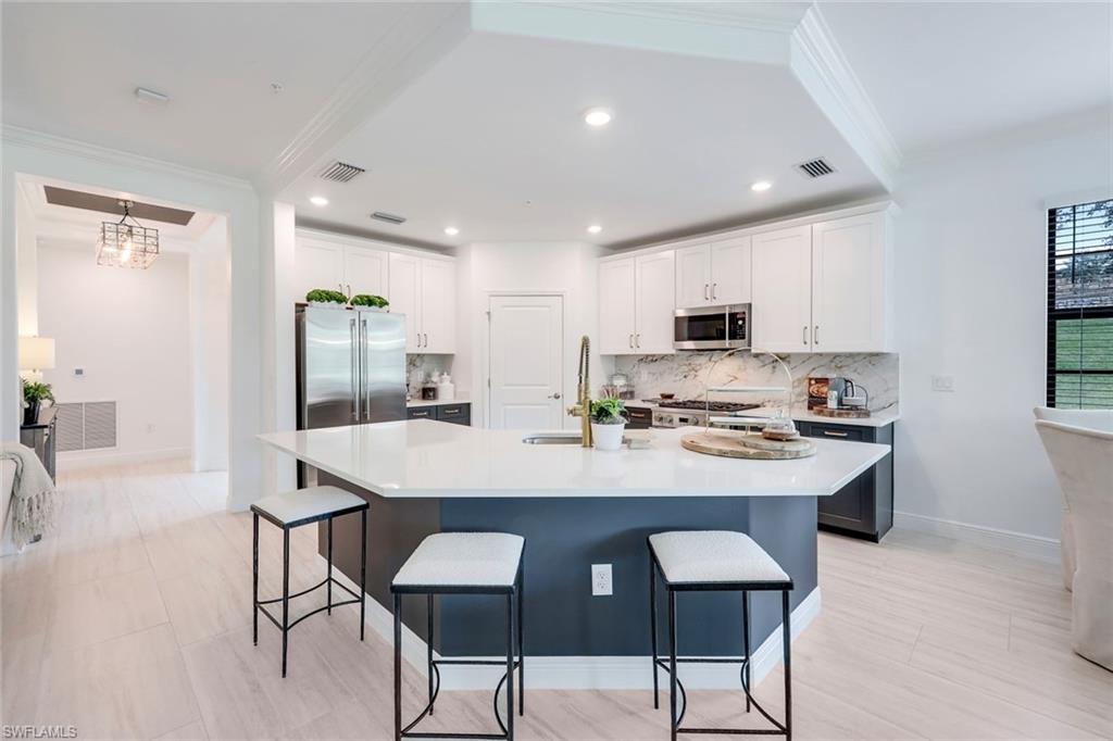 16348 Viansa Way, Unit 101 Naples, FL 34110 - Photo 8 of 34 Stainless steel GE Monogram Appliances