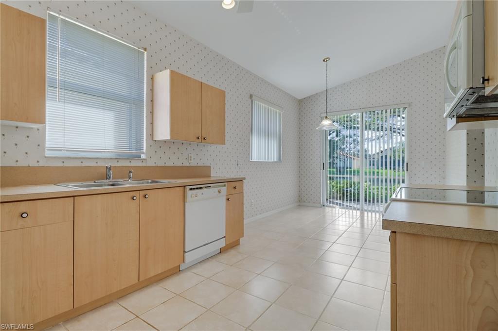 9373 Springview Loop Estero, FL 33928 - Photo 14 of 35 a view of a kitchen with electric appliances