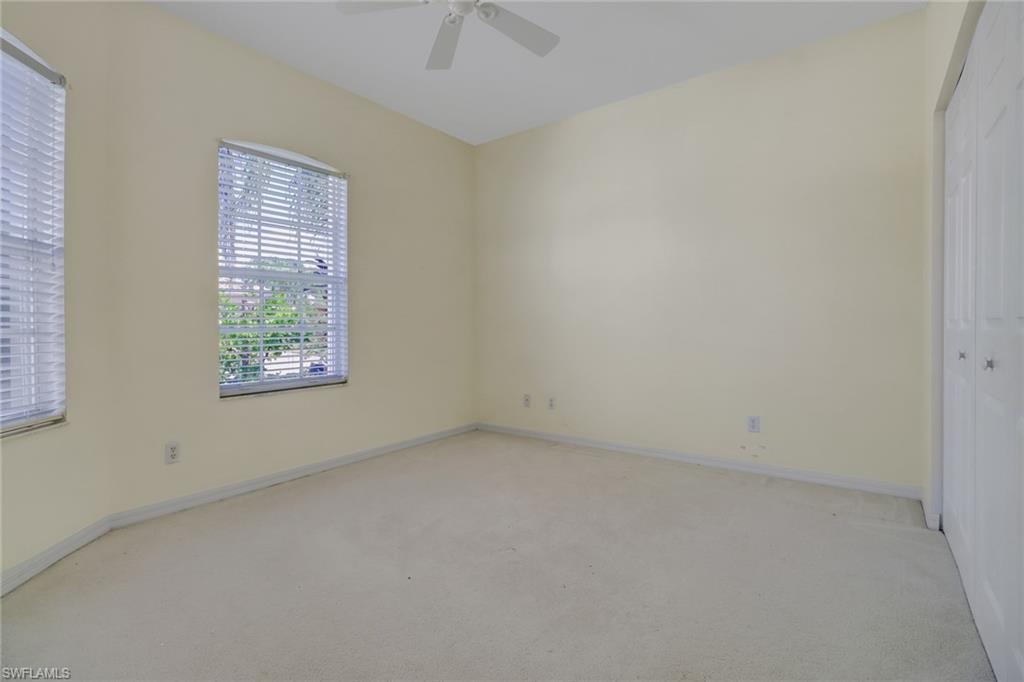 9373 Springview Loop Estero, FL 33928 - Photo 16 of 35 an empty room with windows