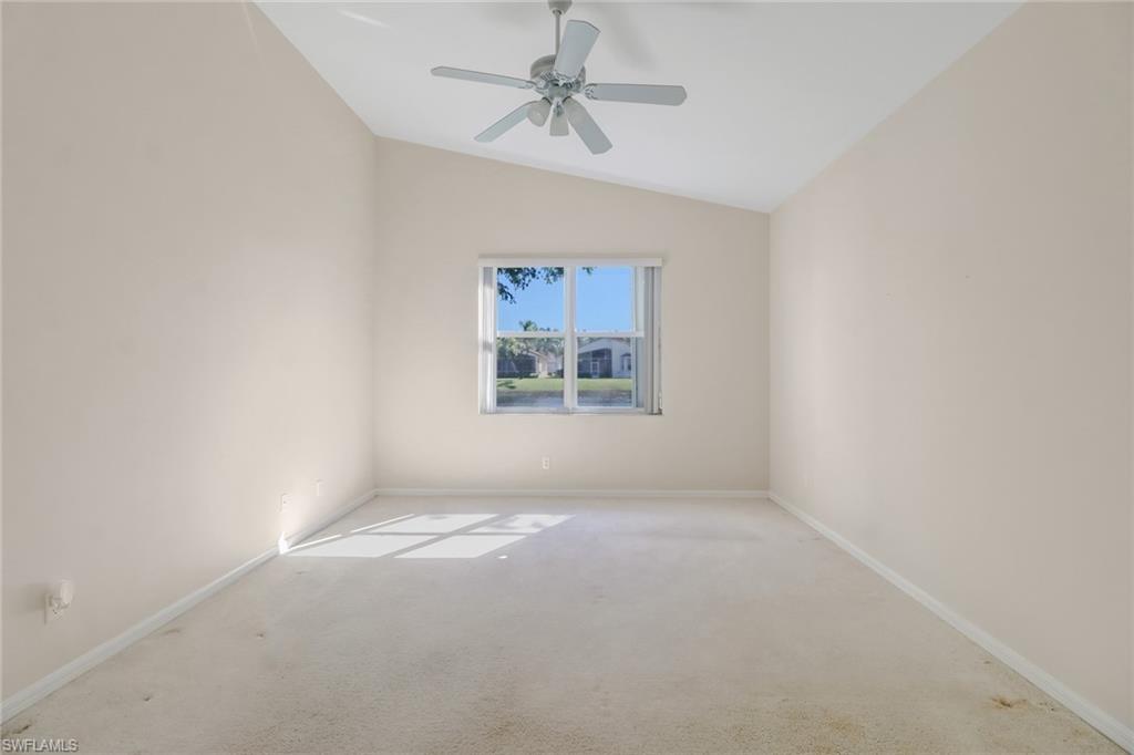 9373 Springview Loop Estero, FL 33928 - Photo 21 of 35 an empty room with windows and fan