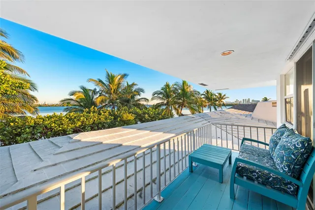 a view of a patio with furniture