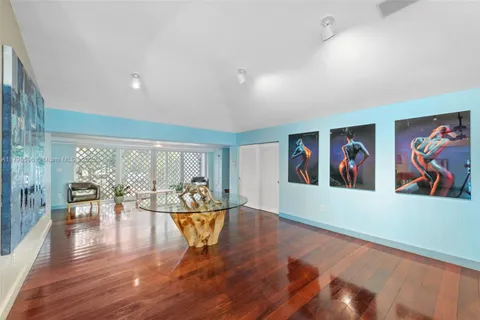 a view of a living room and dining room