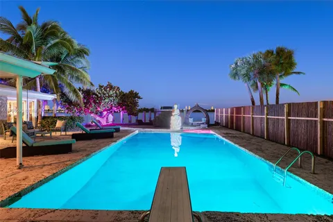 a view of a backyard with a patio