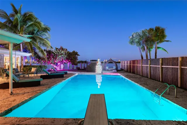 a view of a backyard with a patio