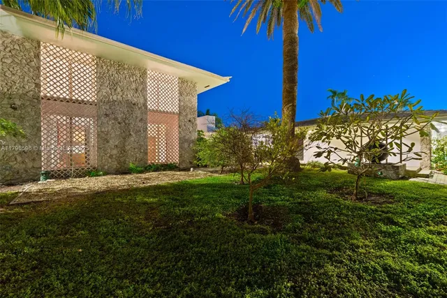 a backyard of a house with lots of green space