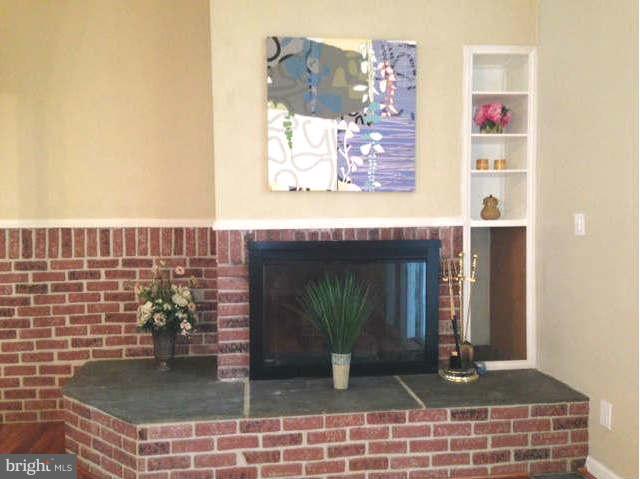 11965 Heathcote Court Reston, VA 20191 - Photo 9 of 27 Fireplace in Family Room