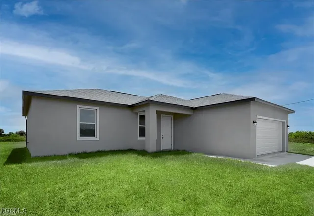 a backyard of a house with lots of green space