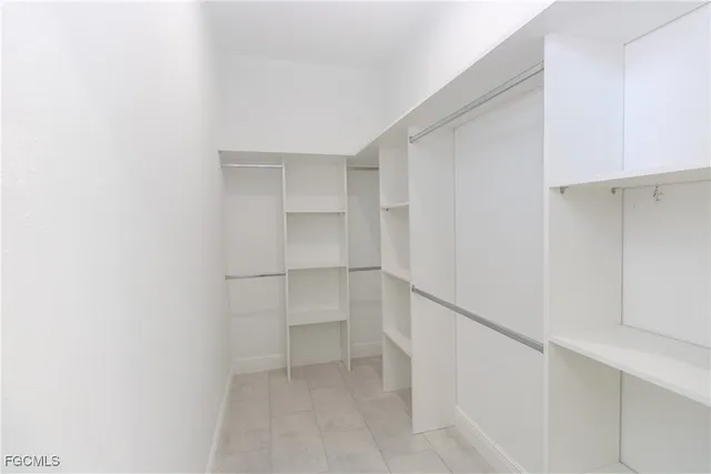 a view of an empty walk in closet