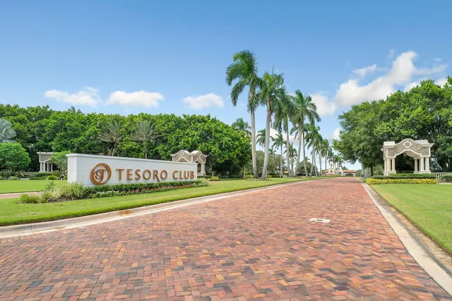 a view of a park that has a sign board