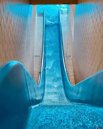 a view of a living room and floor to ceiling window