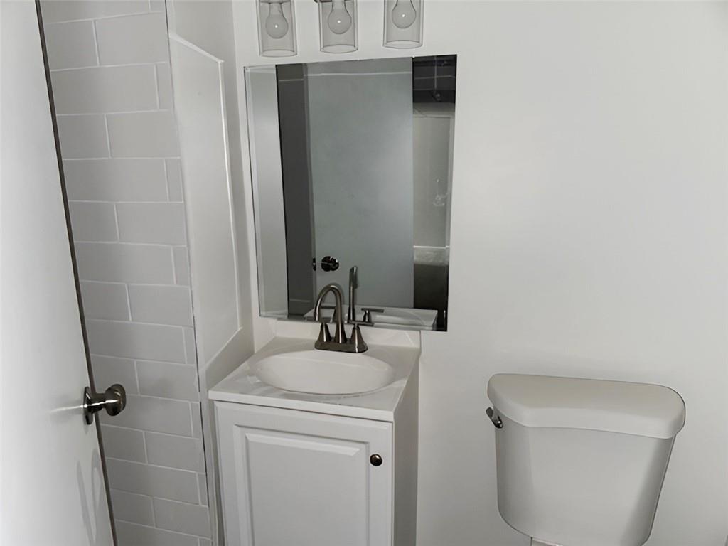 279 Olympic Road Pittsburgh, PA 15236 - Photo 22 of 25 a bathroom with a sink toilet and shower