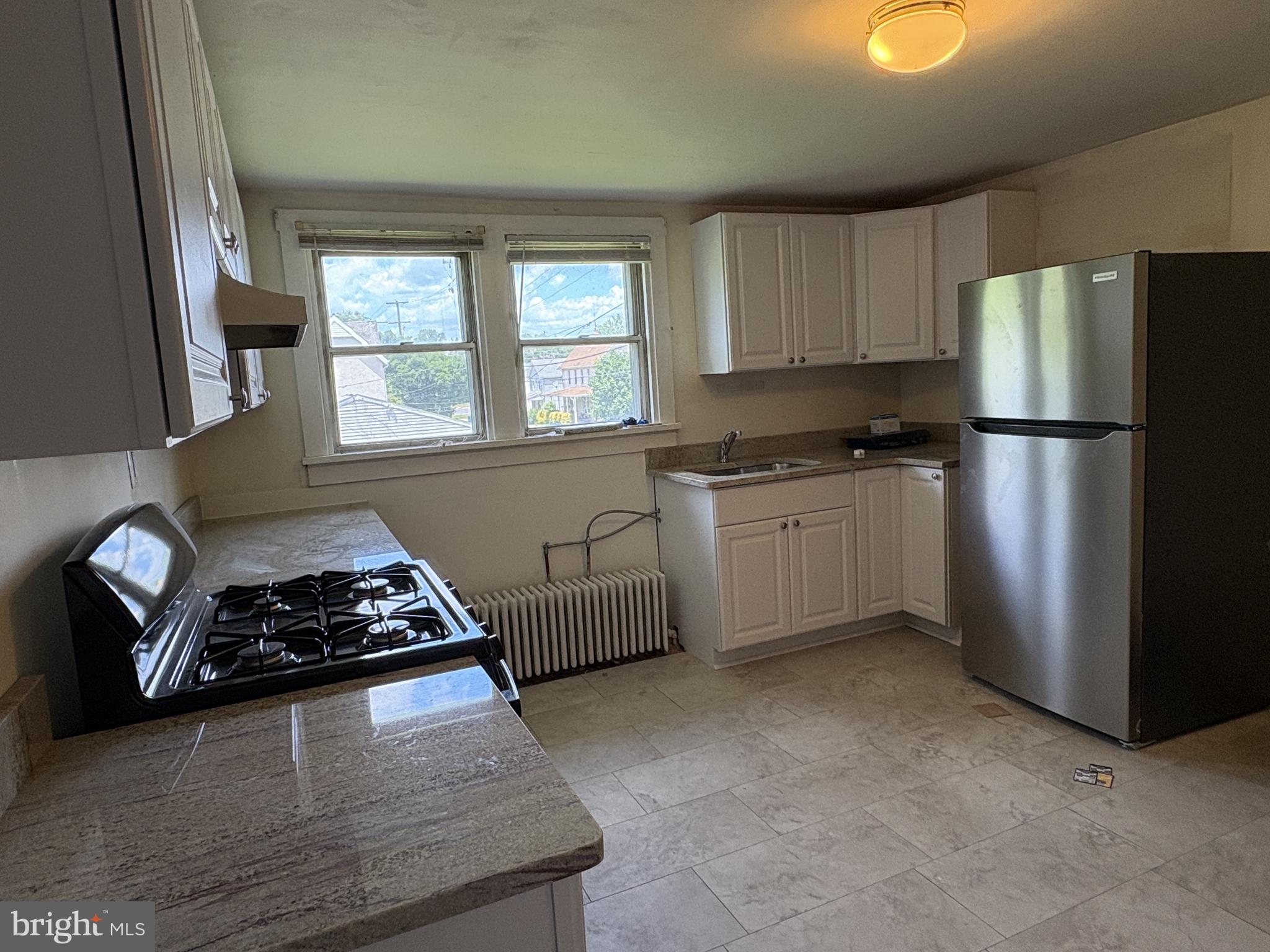 119 Maffitt Street, Unit 4 Elkton, MD 21921 - Photo 5 of 16 Kitchen w/ New Vinyl Tile Floor