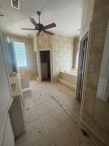 a view of an empty room with a fireplace