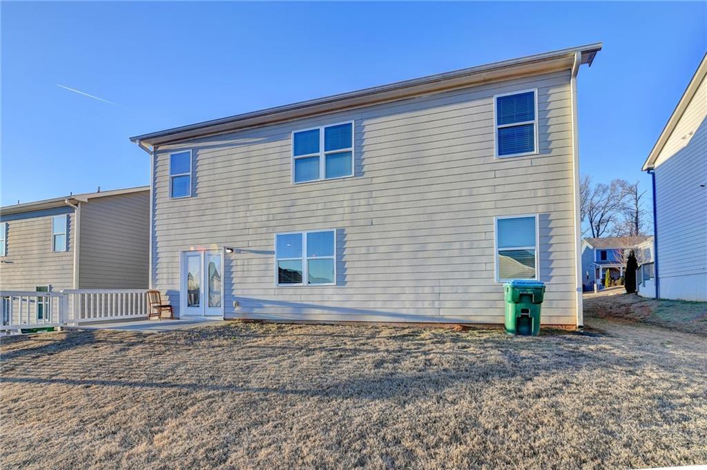 393 Walnut Grv Way Pendergrass, GA 30567 - Photo 41 of 45 a view of a house with backyard
