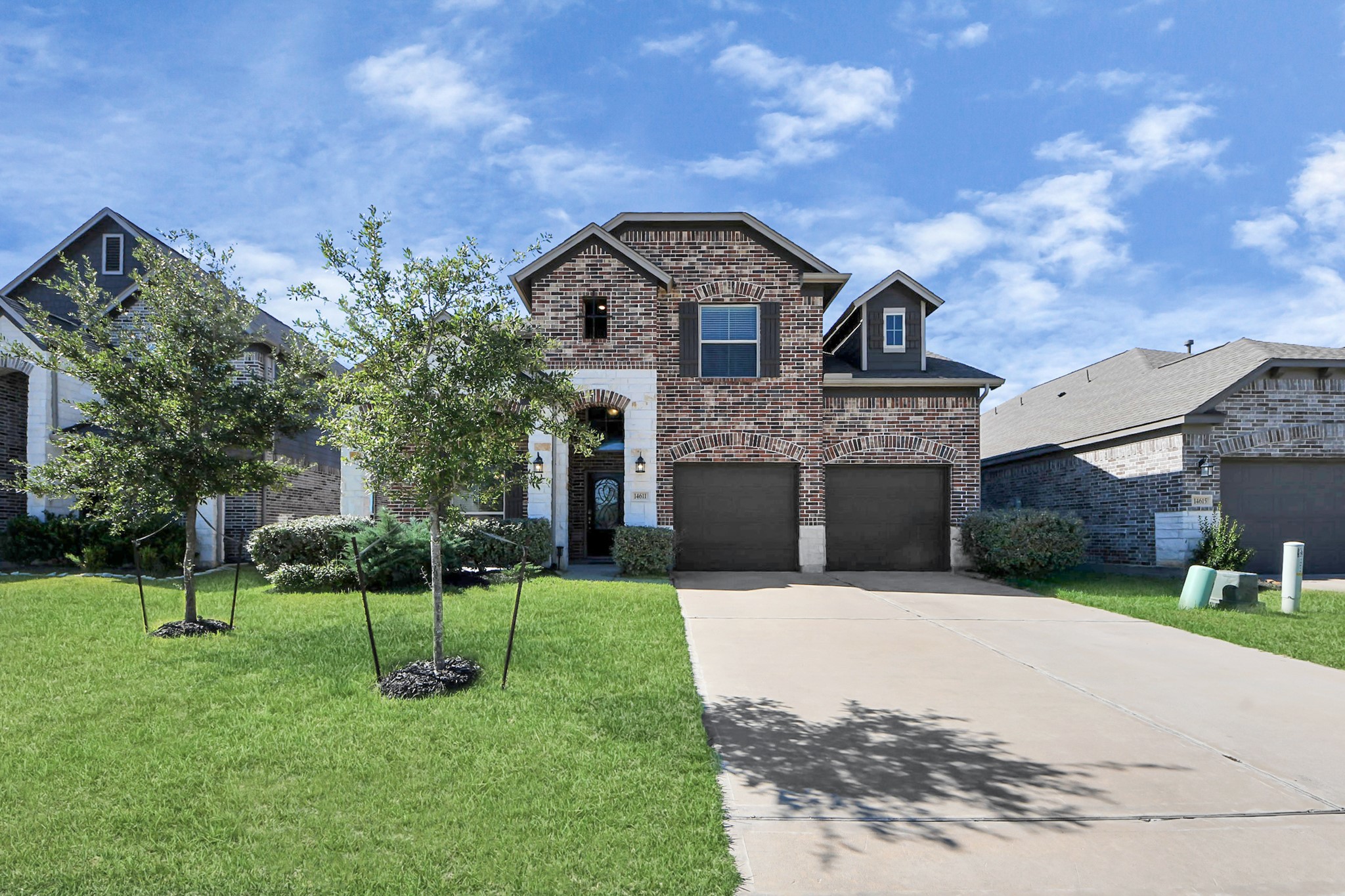 14611 Sycamore Side Way Cypress, TX 77429 - Photo 3 of 46 a front view of a house with a yard