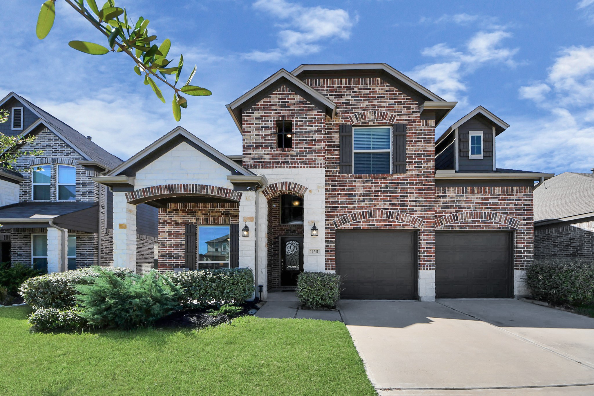 14611 Sycamore Side Way Cypress, TX 77429 - Photo 4 of 46 a front view of a house with a garden