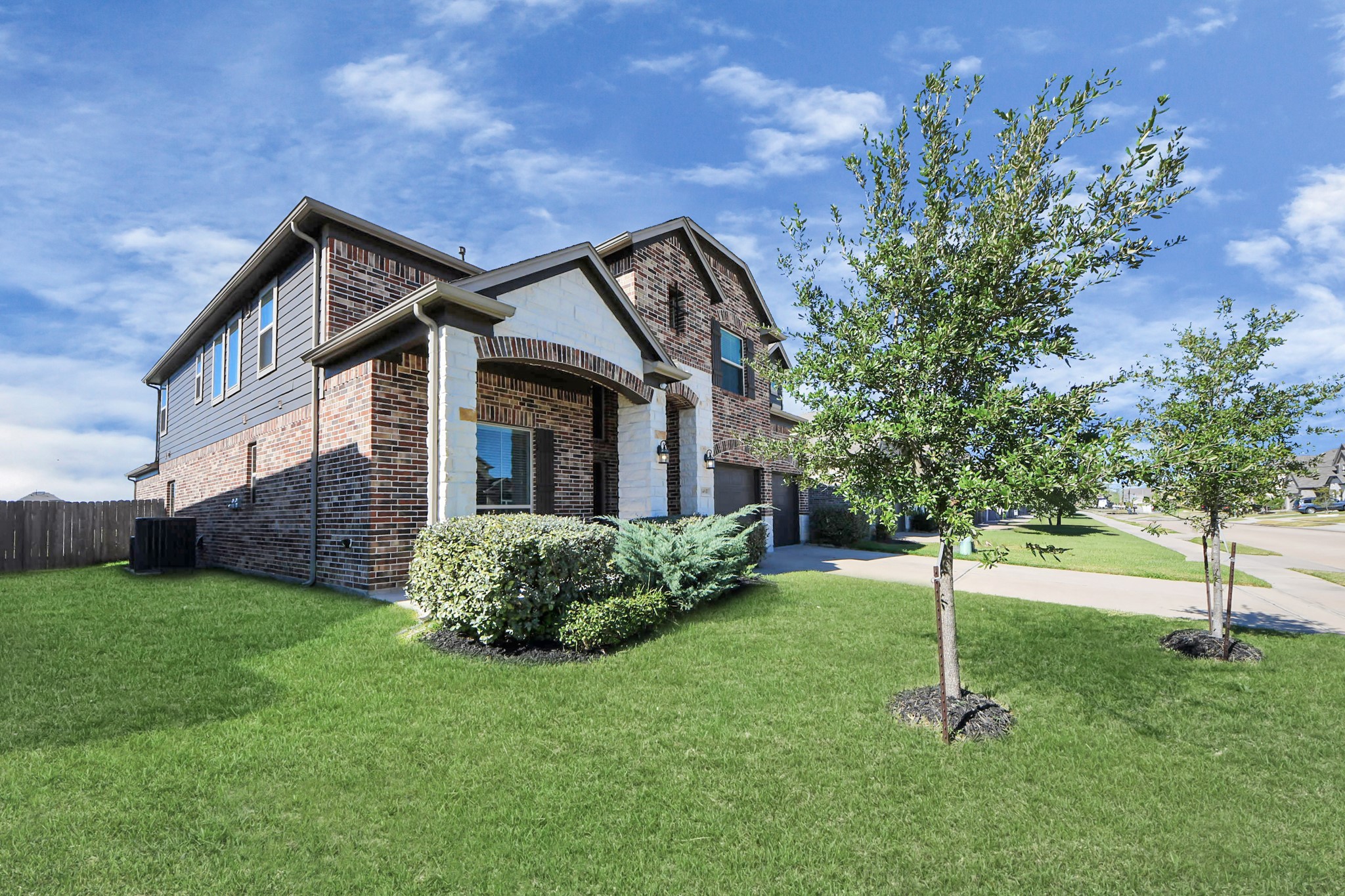 14611 Sycamore Side Way Cypress, TX 77429 - Photo 5 of 46 a backyard of a house with lots of green space