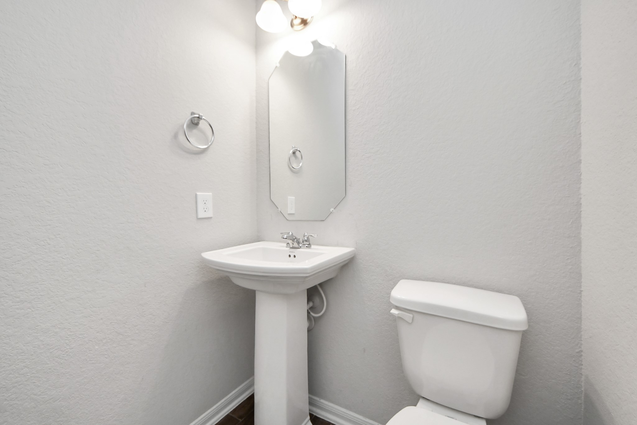 14611 Sycamore Side Way Cypress, TX 77429 - Photo 9 of 46 a bathroom with a toilet sink and mirror